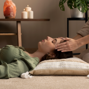 person-conducting-reiki-therapy